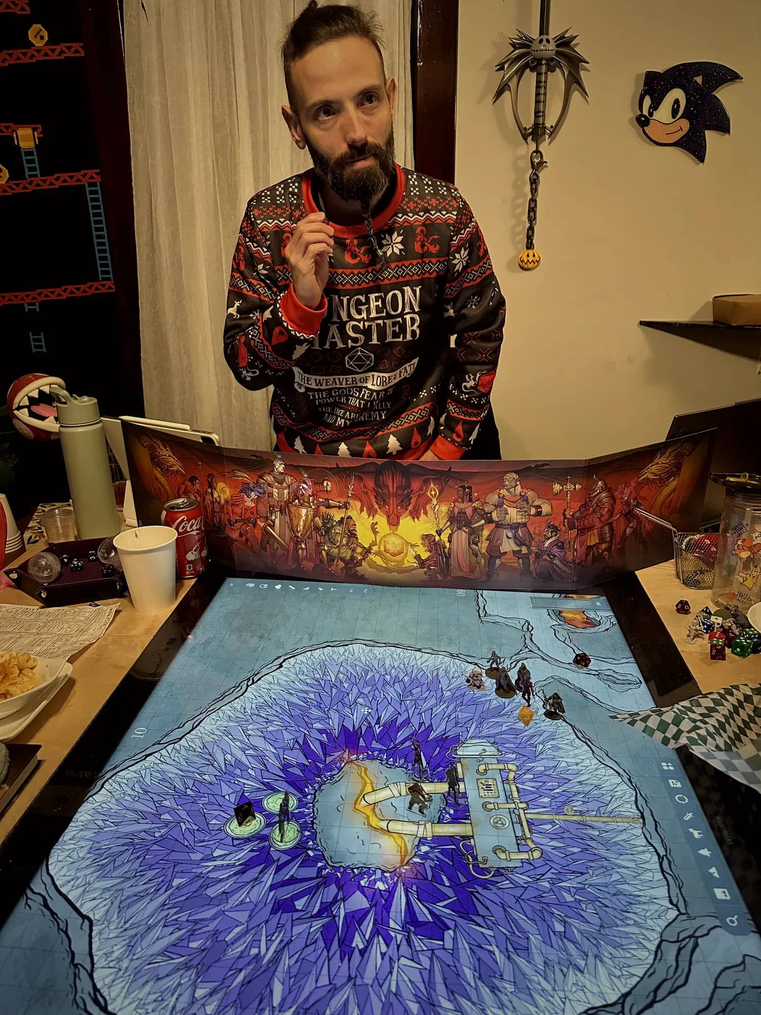 Daniel running a session behind his hand-painted Game Master screen