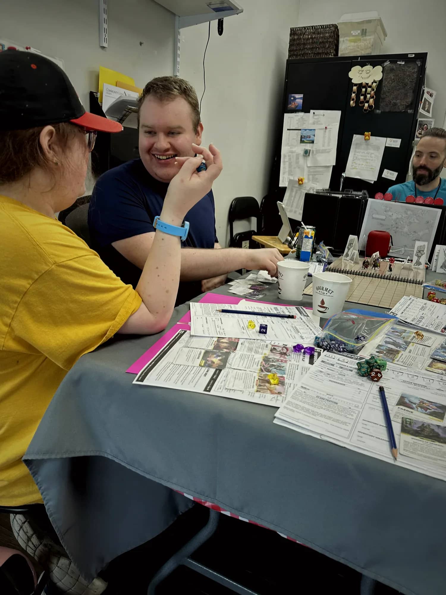 Two players sharing a laugh mid-session