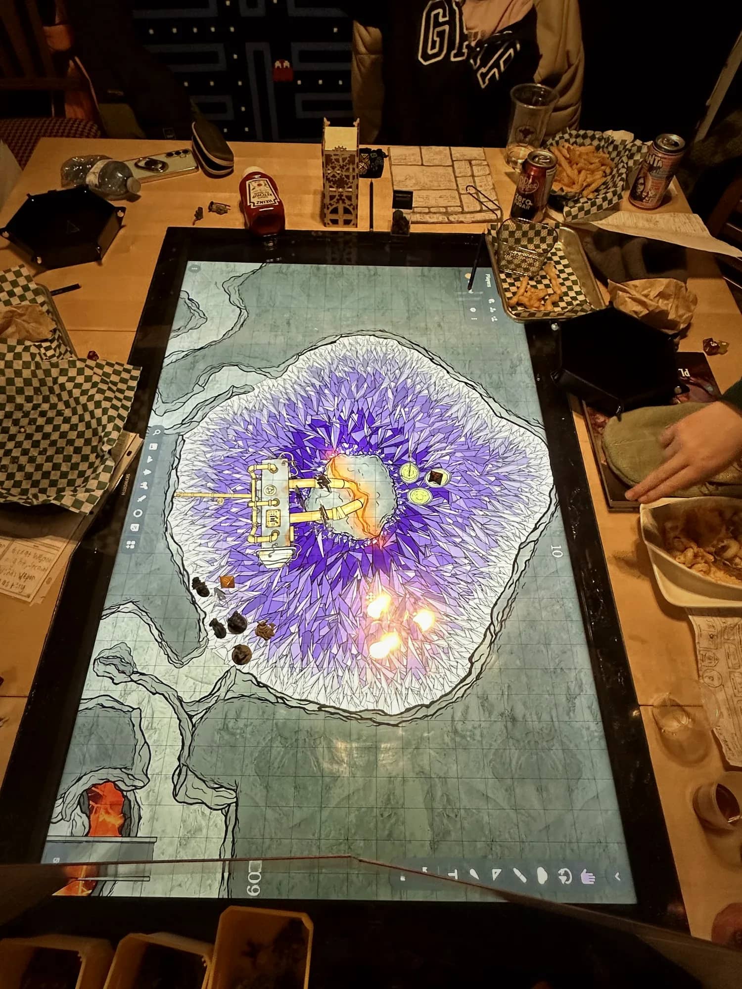 An overhead view of the party closing in on a glowing rift