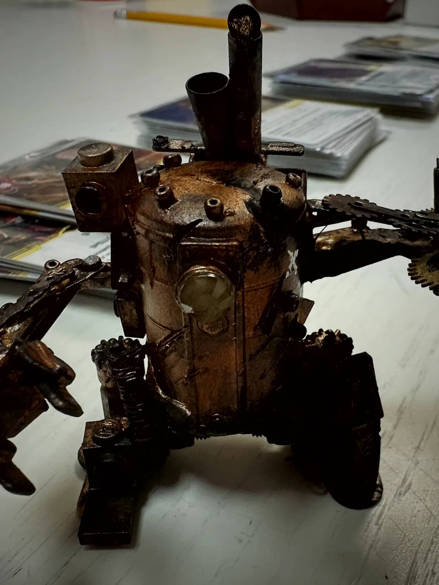 A hand-painted walker miniature, close enough to see the brushwork